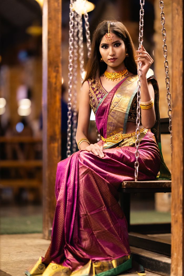 Portrait of a woman in a luxurious saree with traditional jewelry, Bengaluru, India.